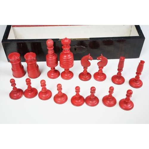 300 - Early 20th century Small box of travel chess pieces and roll out mat board.