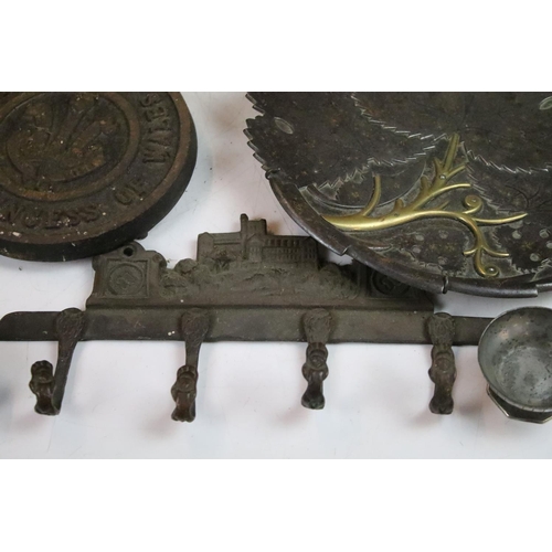 303 - Collection of metal ware to include University of Bangor coat hooks, small brass buckets, 18th centu... 