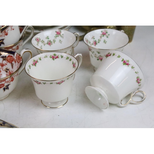 57 - Bridgwoods Ceylon tea set in colbalt and red finish with twelve cups and saucers, milk jug and sugar... 