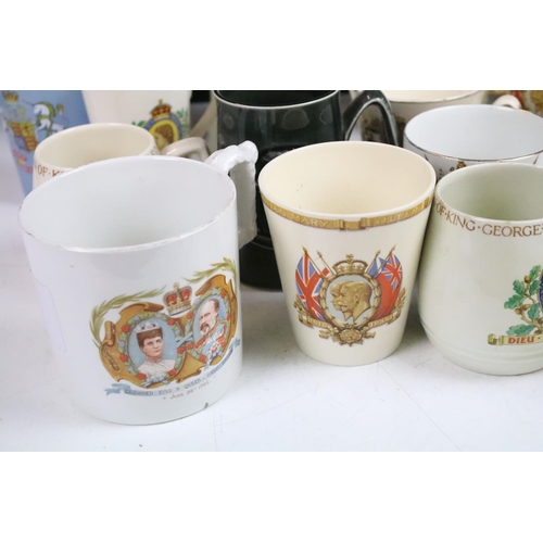 83 - Large assortment of commemorative Royal mugs to include Royal Minton, Holkham Pottery, J & G Meakin,... 