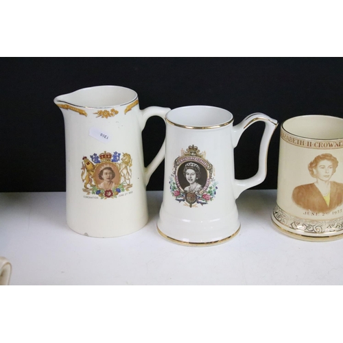 83 - Large assortment of commemorative Royal mugs to include Royal Minton, Holkham Pottery, J & G Meakin,... 