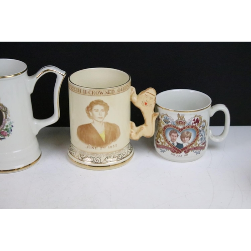 83 - Large assortment of commemorative Royal mugs to include Royal Minton, Holkham Pottery, J & G Meakin,... 