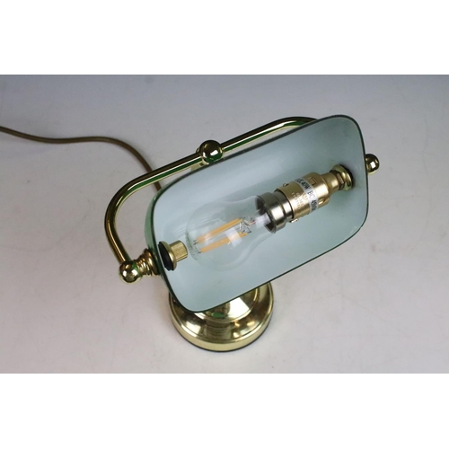 96 - Banker’s style desk lamp of small proportions with green glass adjustable shade and gilt base, 23cm ... 