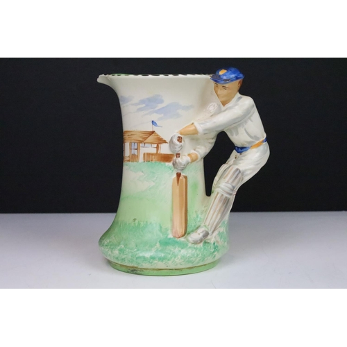 16 - Burleigh Ware pottery cricket jug, the handle moulded as a batsman, manufacturer's beehive transfer ... 