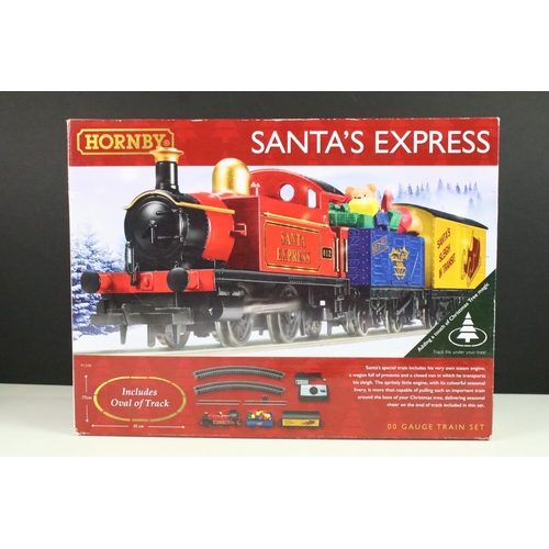 83 - Two boxed Hornby OO gauge electric train sets to include sealed R1249 Country Rambler and R1248 Sant... 