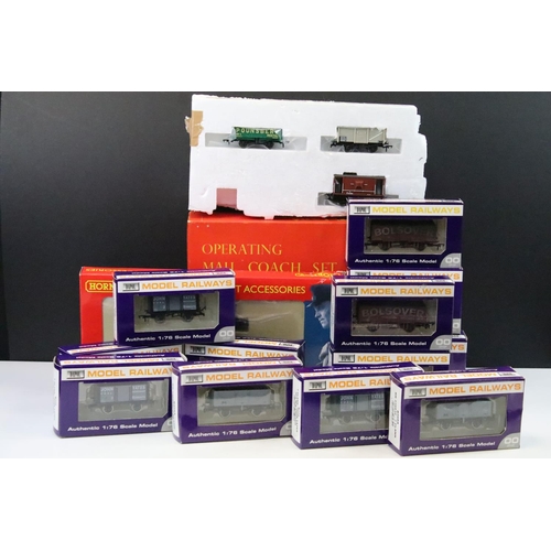 119 - Quantity of OO gauge rolling stock to include 12 x boxed Dapol wagons / trucks, a boxed Hornby R6226... 