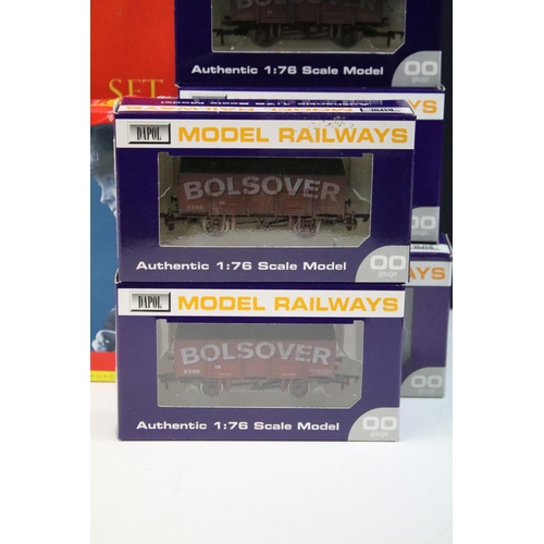 119 - Quantity of OO gauge rolling stock to include 12 x boxed Dapol wagons / trucks, a boxed Hornby R6226... 