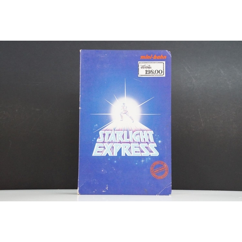 129 - Boxed Marklin Mini Bahn Starlight Express train pack containing 2 x locomotives and controller (no t... 