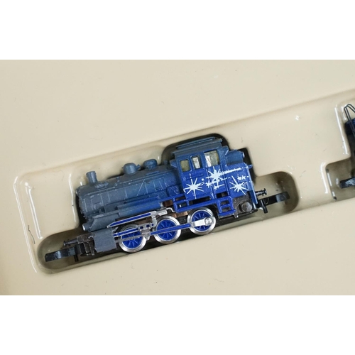 129 - Boxed Marklin Mini Bahn Starlight Express train pack containing 2 x locomotives and controller (no t... 