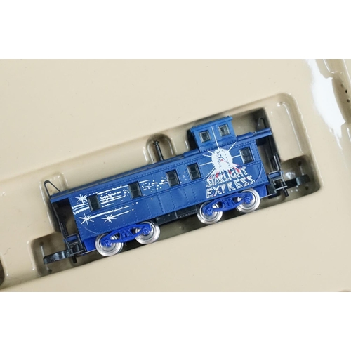 129 - Boxed Marklin Mini Bahn Starlight Express train pack containing 2 x locomotives and controller (no t... 