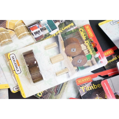 76 - Around 100 carded & boxed Hornby Skaledale OO gauge accessory items to include Wooden Summer House, ... 