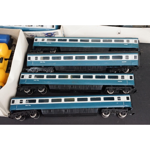 154 - Around 75 OO gauge items of rolling stock to include Triang, Hornby and Lima featuring coaches, wago... 