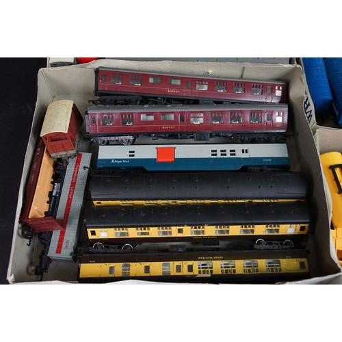 154 - Around 75 OO gauge items of rolling stock to include Triang, Hornby and Lima featuring coaches, wago... 