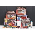 A group of Transformers G1 and G2 figures including Metroplex