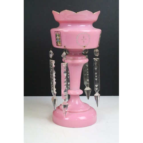 73 - Pair of Victorian pink glass lustres with painted floral decoration and prismatic drops. 31cm tall.