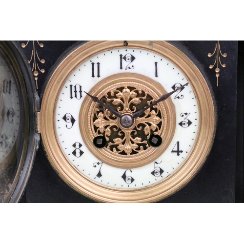 110 - Late 19th century black marble two train mantel clock, the dial with pierced gilt metal central pane... 