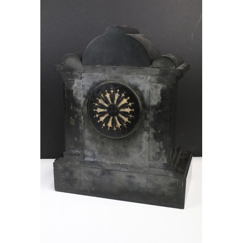 110 - Late 19th century black marble two train mantel clock, the dial with pierced gilt metal central pane... 