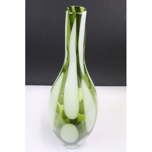 115 - Green and white art glass vase with slender neck, 49.5cm high