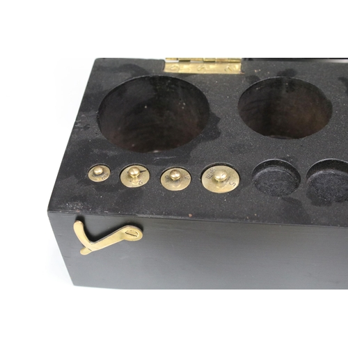 118 - Cased set of thirteen brass weights, ranging from 1 gram to 1 kilogram