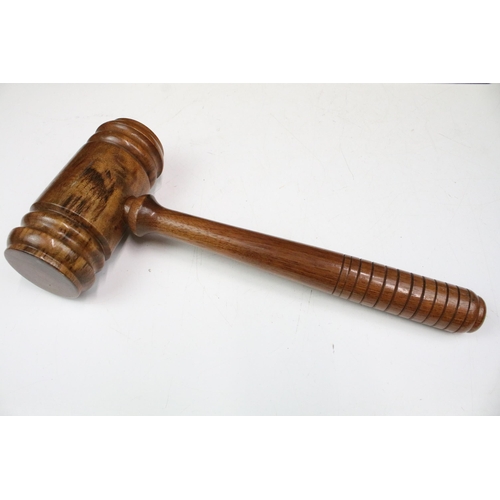 124 - Hardwood gavel and plinth in display box frame, 32.5 x 41cm overall