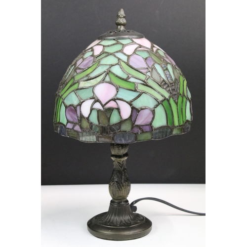 128 - Pair of Tiffany style glass table lamps, with green, pink and purple glass, 35cm high