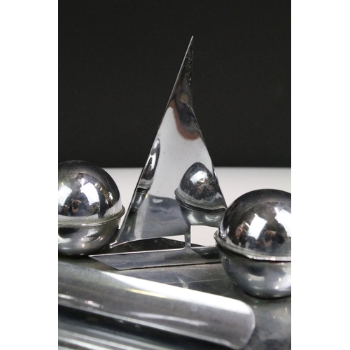 129 - Art Deco chrome nautical themed standish or desk stand, the rectangular base set with two globular i... 