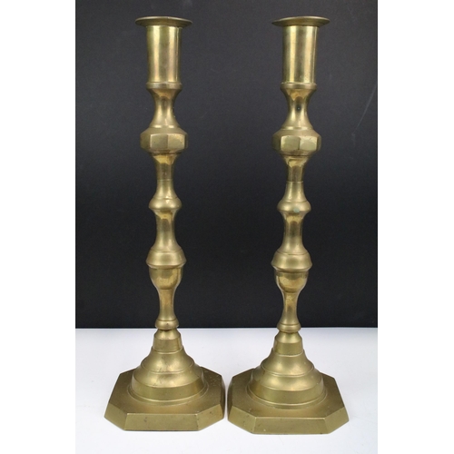 134 - Pair of 20th century brass candlesticks of large proportions, 47.5cm high