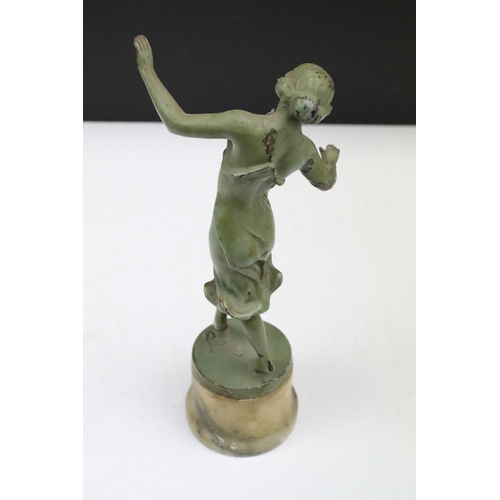 156 - Vintage Art Deco cast dancing figurine with green patina on circular onyx base, H 26cm