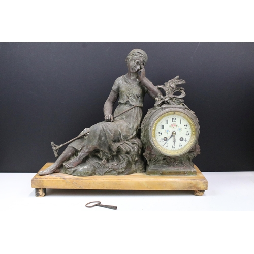 174 - Early 20th century clock garniture in spelter, cast metal in form of young farm girl sat on corn tog... 