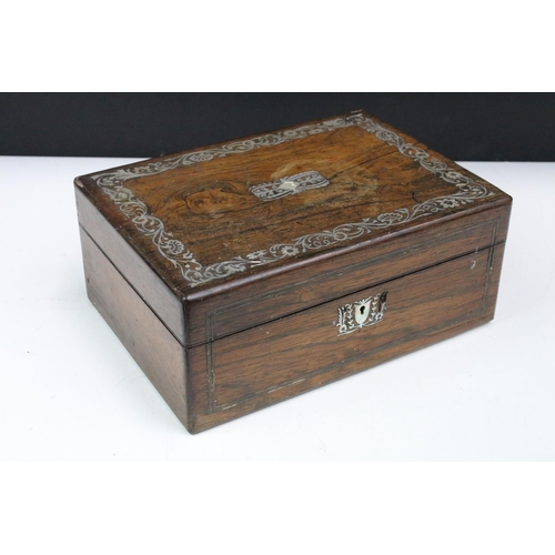 176 - An early 20th century wooden box with mother of pearl decorative inlay, measures approx 28cm x 20cm ... 