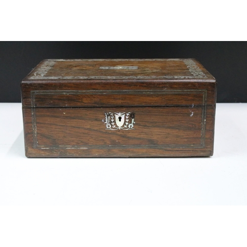 176 - An early 20th century wooden box with mother of pearl decorative inlay, measures approx 28cm x 20cm ... 