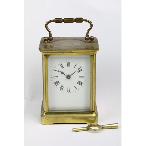 195 - A early 20th century brass cased carriage clock with beveled glass panels together with a mid 20th c... 