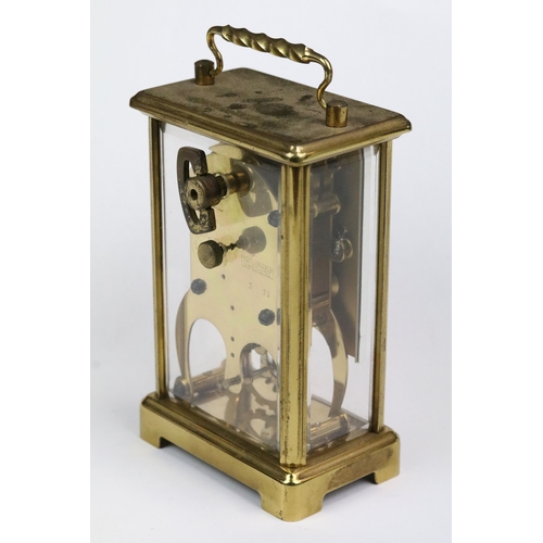 195 - A early 20th century brass cased carriage clock with beveled glass panels together with a mid 20th c... 