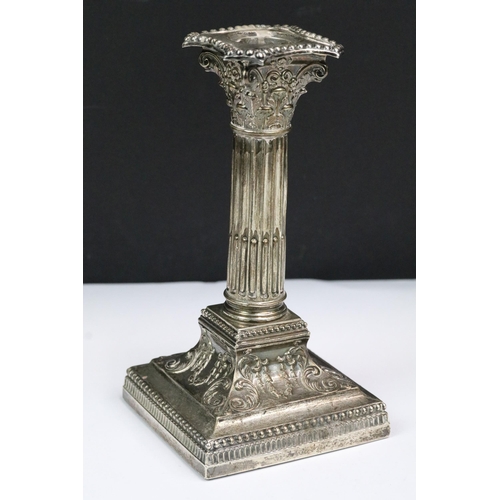 198 - A pair of fully hallmarked sterling silver Corinthian column candlesticks, maker marked for James Di... 