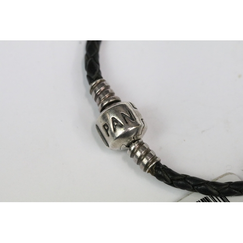 202 - Pandora - Pandora silver snake chain bracelet, together with Pandora leather bracelet with Pandora s... 