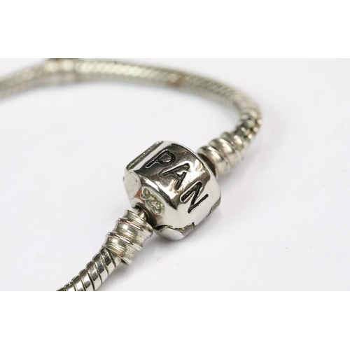 202 - Pandora - Pandora silver snake chain bracelet, together with Pandora leather bracelet with Pandora s... 