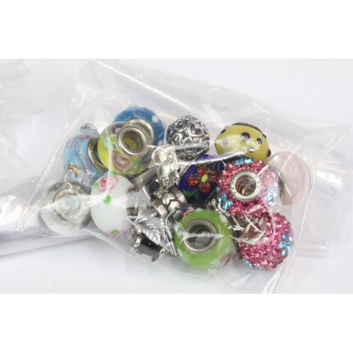 203 - Selection of beads and beaded jewellery including 7 x Chrysalis silver and glass beads, 7 x PK silve... 