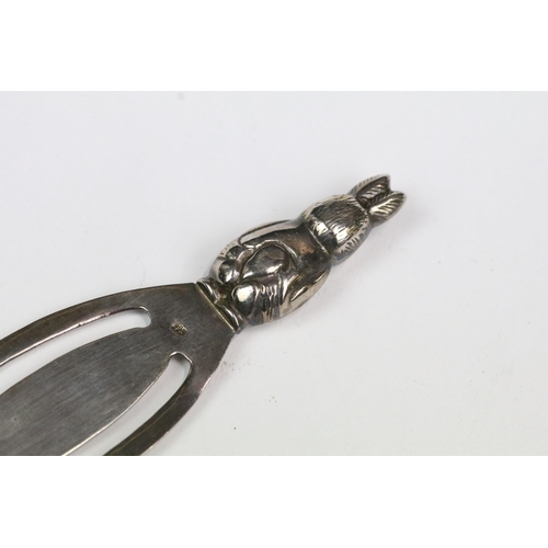 208 - A fully hallmarked sterling silver bracelet together with a white metal bookmark with rabbit finial ... 