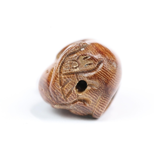 210 - Four carved wood miniature netsuke figures to include signed dog, mouse with nut, rabbit and hen