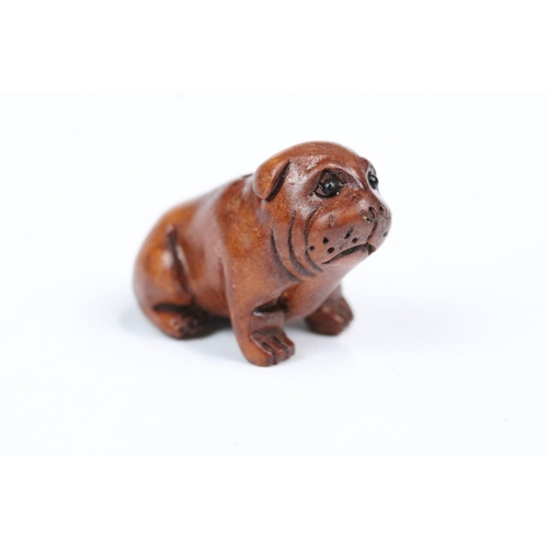 210 - Four carved wood miniature netsuke figures to include signed dog, mouse with nut, rabbit and hen