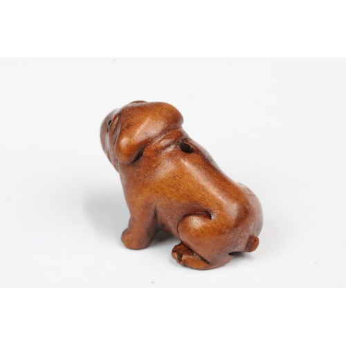 210 - Four carved wood miniature netsuke figures to include signed dog, mouse with nut, rabbit and hen