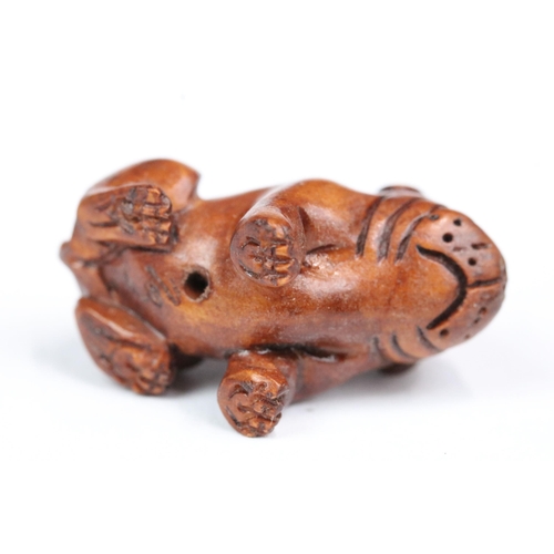 210 - Four carved wood miniature netsuke figures to include signed dog, mouse with nut, rabbit and hen