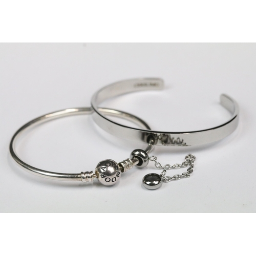 211 - A small collection of white metal and 925 silver bracelets and bangles together with a Blue Peter ba... 