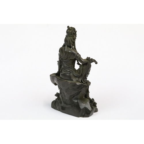 218 - An ornamental Chinese bronze Kwan Yin figurine, stands approx 11cm in height.