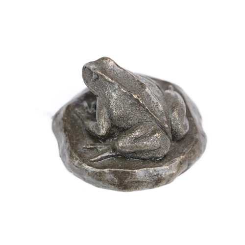 219 - A collection of miniature ornamental animal figures together with a carved stone oriental figure.