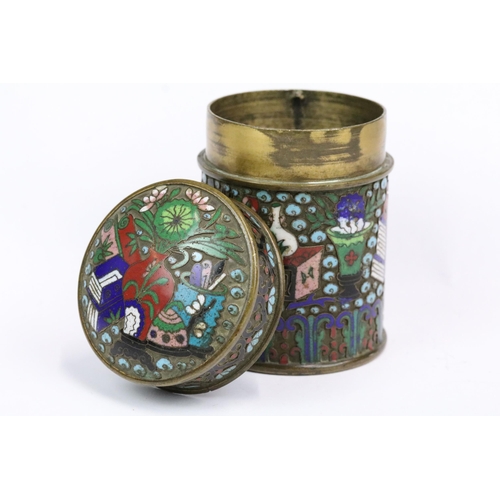 225 - A Chinese decorative cloisonne enamel lidded jar, stands approx 10cm in height.