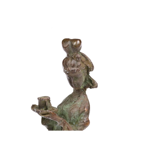 229 - A Chinese ornamental bronze figure of a female, stands approx 12cm in height.