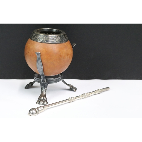 235 - An Argentinian Mate Gourd / Yerba tea cup together with an .800 silver mate spoon.