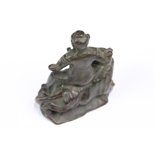 240 - A Chinese ornamental bronze figure / incense burner of man upon tiger, stands approx 6cm in height.