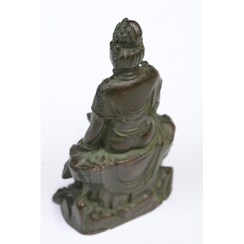 245 - A Chinese ornamental bronze Guanyin figure, stands approx 12cm in height.